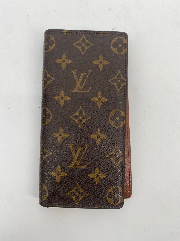 LOUIS VUITTON ZIPPY WALLET IN MONOGRAM PREMIUM